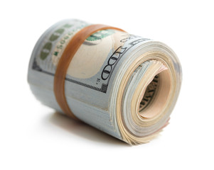 rolled stack of dollars isolated on white background