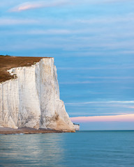 Stunning colorful dramatic Summer sunset over Seven Sisters landscape in Englad