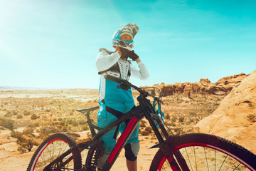 Cyclist riding a bicycle. Downhill.