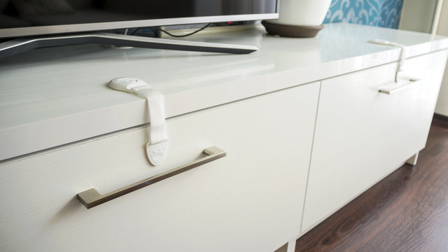 flexible latch on the cabinet. 
