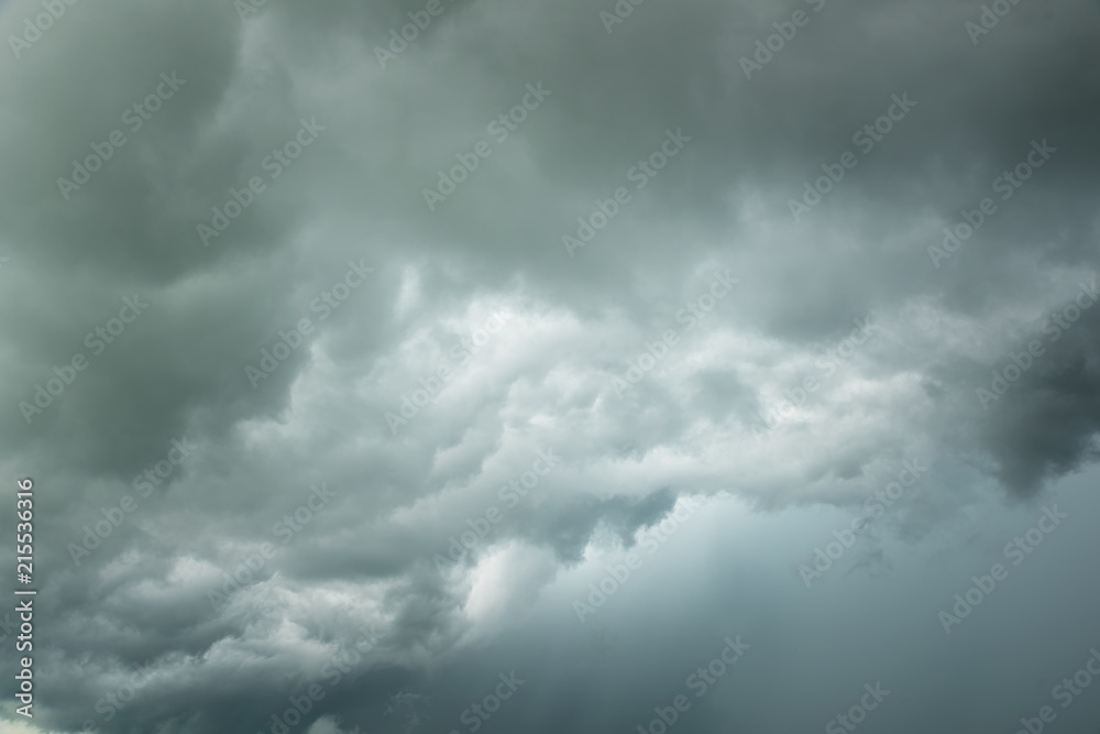 Wall mural Storm clouds dramatic with black clouds and moody sky, Motion dark sky and rainy