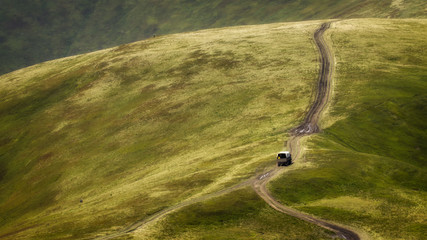 The road is high in the Carpathians, on the ridge
