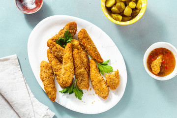 Top view chicken breast nuggets sour-sweet sauce