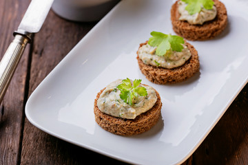 Canape with fish pate, close up