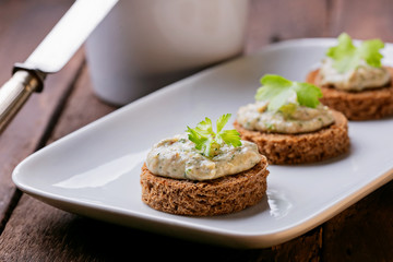 Canape with fish pate of mackerel , top view