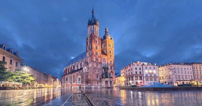 Basilica of Saint Mary at dusk with reflection in Krakow, Poland (static image with animated sky)
