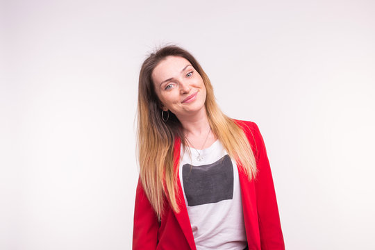 Stylish european woman in a red jaket on white background