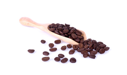 coffee bean in wooden spoon on white background.