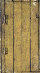 old rustic wooden yellow door