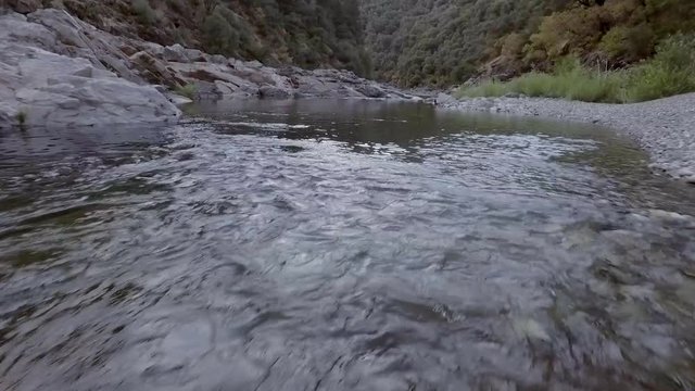 Beautiful Yuba River in Northern California flowing in the middle of summer