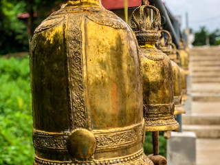 golden bells in buddist temple in Mukdahan,Thailand