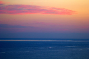 Naklejka na ściany i meble beautiful view of the sea and the sky at sunset pastel color minimalism