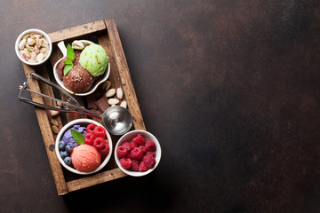 Fototapeta na wymiar Ice cream with nuts and berries