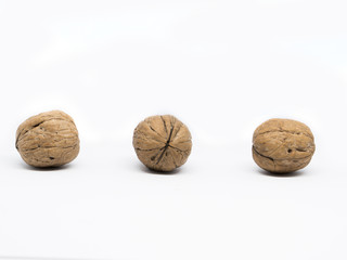 Three walnut isolated on white background