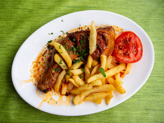 Grilled Chicken on bone with chips
