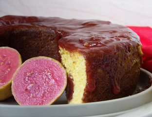 Typical Brazilian sweet dessert corn cake with guava paste. And guavas fruits  composing the scene.