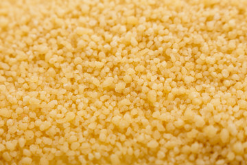 fresh couscous on a white acrylic background