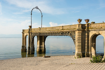 View of the pier with viewing platform from the castle to the water of Lake Constance in Friedrichshafen