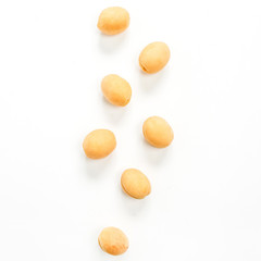 Yellow apricots isolated on white background. Flat lay, top view.