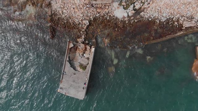 Rocky beach view from Hong Kong Old Lei Yue Mun Quarry. Big chunky rocks beach.