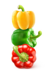 Isolated peppers. Three bell peppers of different colors (red, green, yellow) on top of each other isolated on white background with clipping path