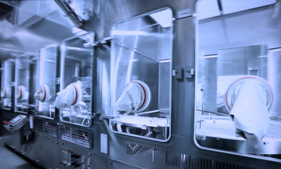 Abstract, blur, bokeh background, defocusing - image for the background.   Medicine, pharmacy, public health and the concept of pharmacy and the manufacture, laboratory science.