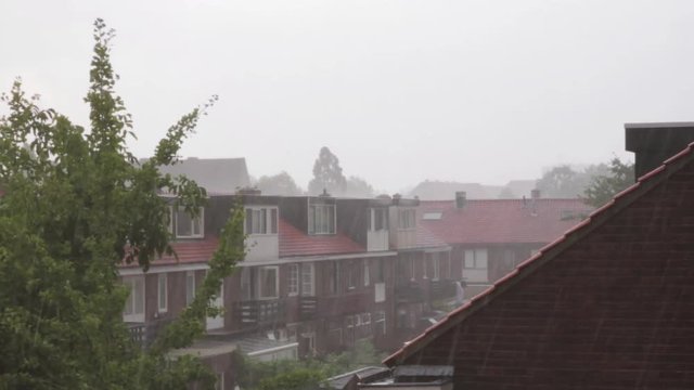 Lots of rain in a suburban neighourhood.