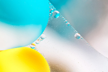 Beautiful color abstract background from mixied water and oil. Pastel colored abstraction.