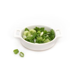 Sliced green onion in a white container, isolated on a white background