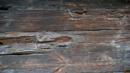 Naklejka premium Old house, texture of wooden walls outside