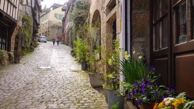 DINAN, FRANCE - APRIL 06, 2018: view of empty beautiful street with old traditional houses at the center of Dinan, Brittany, France
