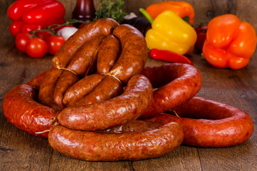 Pork sausages over wooden