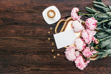 Morning concept. Coffee cup with pink peony on gold tray. Wedding, mothers day, valentines day