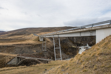Fototapeta na wymiar Bridge crossing Gilsa river in Jokuldalur in Iceland