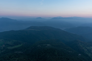 Mountain range panorama, scene tinted in blue due to evening time at Catalonia, Spain