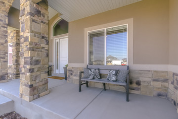 Bench with pillows on a porch