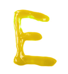 Single letter made of sauce isolated