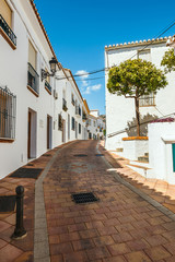 charming white village in Andalusia with white houses, Spain