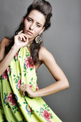 Fashion model in bright  dress