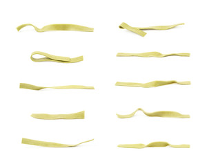 Obraz premium Single piece of fettucce pasta isolated