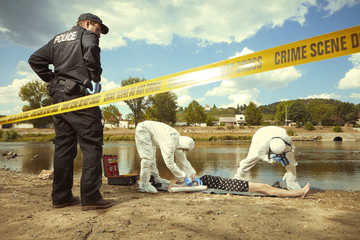 Woman body in black apparel found drowned near summer river bank in city