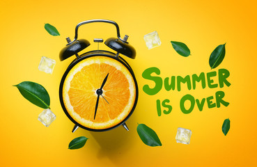 Summer is Over Typography. Alarm Clock of Orange Fruit Green Leaves and Ice Cube Flying Around on...