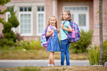 Girls with backpack is going to school