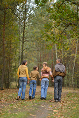 Fototapeta premium Family of four in park