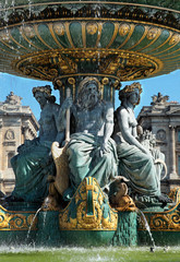 Fototapeta na wymiar Fountain on Place de la Concorde in Paris, France