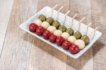 The cooking step of making Japanese Dango dessert with 3 different color in pink(red), white, and green, recipe, hanami Dango, tsukimi Dango, copy space