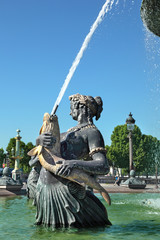 Fototapeta na wymiar Fountain on Place de la Concorde in Paris, France