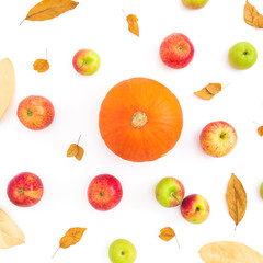 Thanksgiving autumn background with fall dried leaves, apples and pumpkin on white background. Flat lay, top view