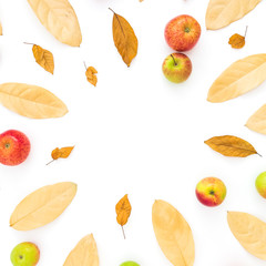 Autumn composition. Frame made of autumn dried leaves and apple fruits on white background. Flat lay, top view, copy space