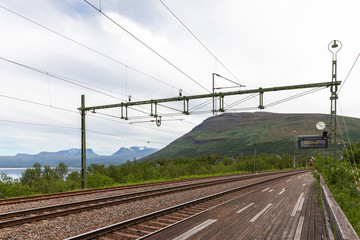 Fototapeta na wymiar View from Björkliden train station in Sweden with famous lapporten mountain.